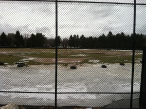 AIC's baseball field is still wet and soggy.