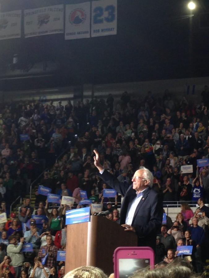 Presidential candidate Bernie Sanders waves to his supporters at the MassMutual Center on October 3
