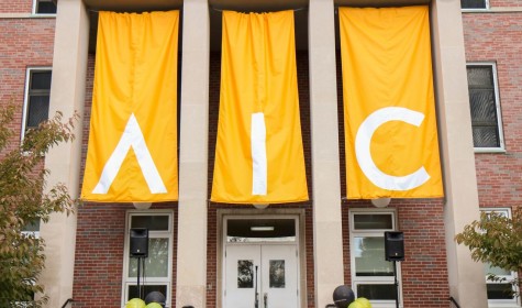 AIC's new logo on prominent display outside Amaron Hall. 