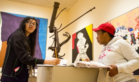 Shiane Wilkins (left) and Ruthlyn Richards drawing at the museum.