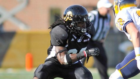 AIC Football Defensive Back Devonte Dillion in action.