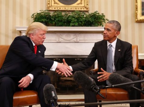 Trump shaking hands with Obama.