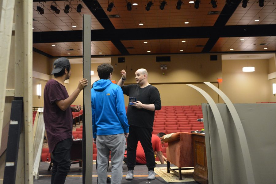 AIC Theater Arts Professor Frank Borelli instructing Theater students on some finishing touches. (Photo by Keiyon Johnson)