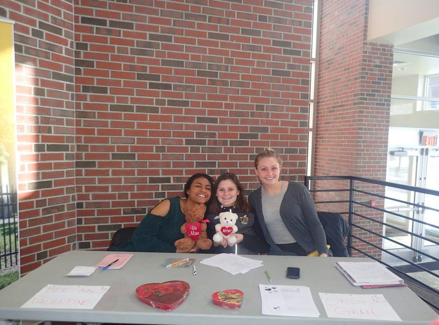  Shanell Russo, Ally Pothier and Molly Plante helping raise money for the womens rugby team.