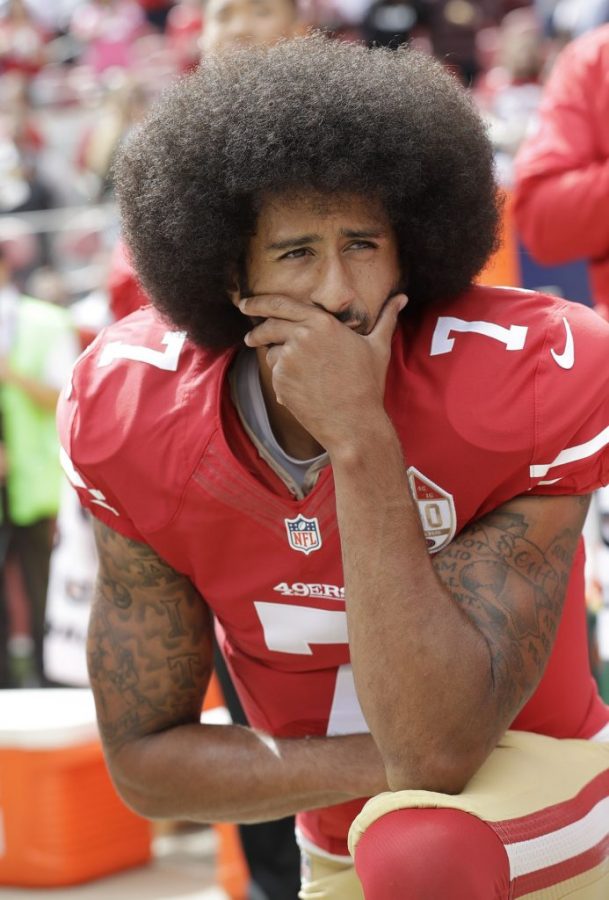 San Francisco 49ers quarterback Colin Kaepernick kneels during the national anthem before an NFL football game against the Dallas Cowboys in Santa Clara, Calif., Sunday, Oct. 2, 2016. (AP Photo/Marcio Jose Sanchez)