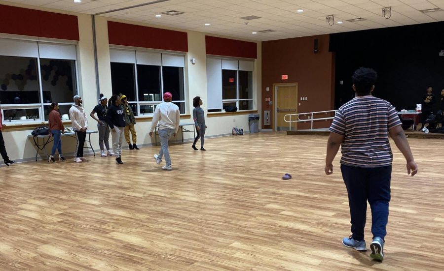 P.R.I.D.E holding its third practice in the campus center auditorium. 