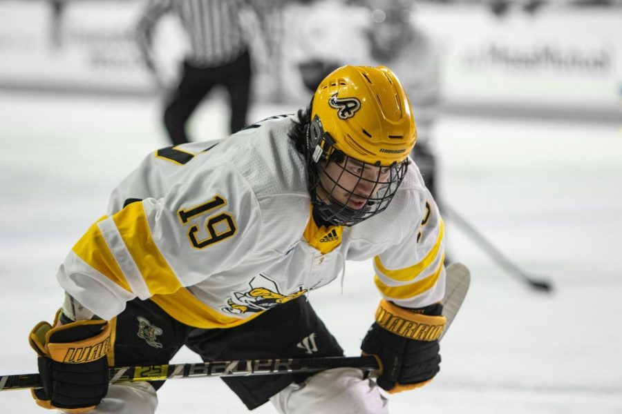 Sophomore Forward Elijiah Barriga on the ice during AICs last regular season game