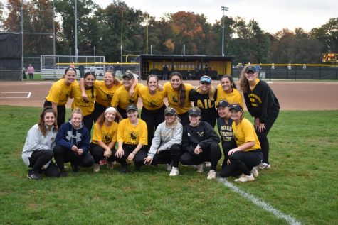 Former and current Yellow Jackets attend the AIC Women’s Alumna Softball Game.