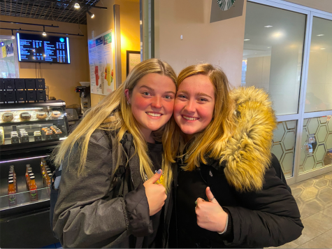 Marissa Long (left) and Rose McCaffrey (right) smile in the Hive! 