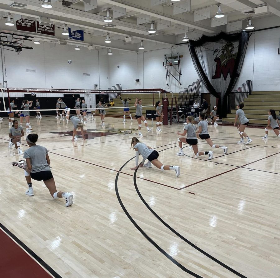 The Yellow Jackets warm up during practice.