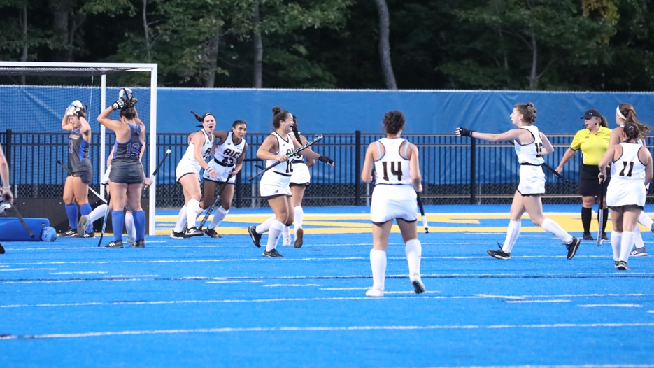 The Yellow Jackets celebrate after scoring a goal.